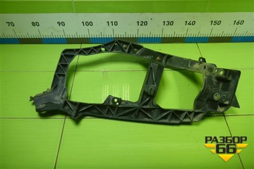 Кронштейн фары правой (MN105060) для Mitsubishi Colt с 2004г (Кольт)