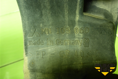 Кронштейн фары правой (MN105060) для Mitsubishi Colt с 2004г (Кольт)